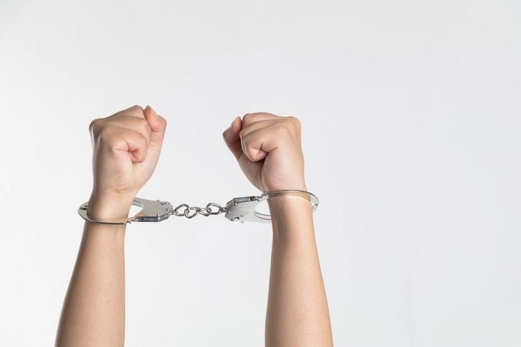 Arrested Woman Handcuffed Hands