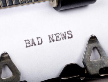 Typewriter close up shot, concept of Bad News
