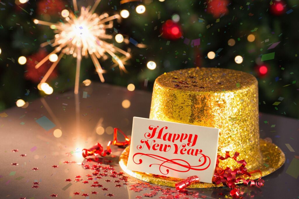 happy new year card on table set for party