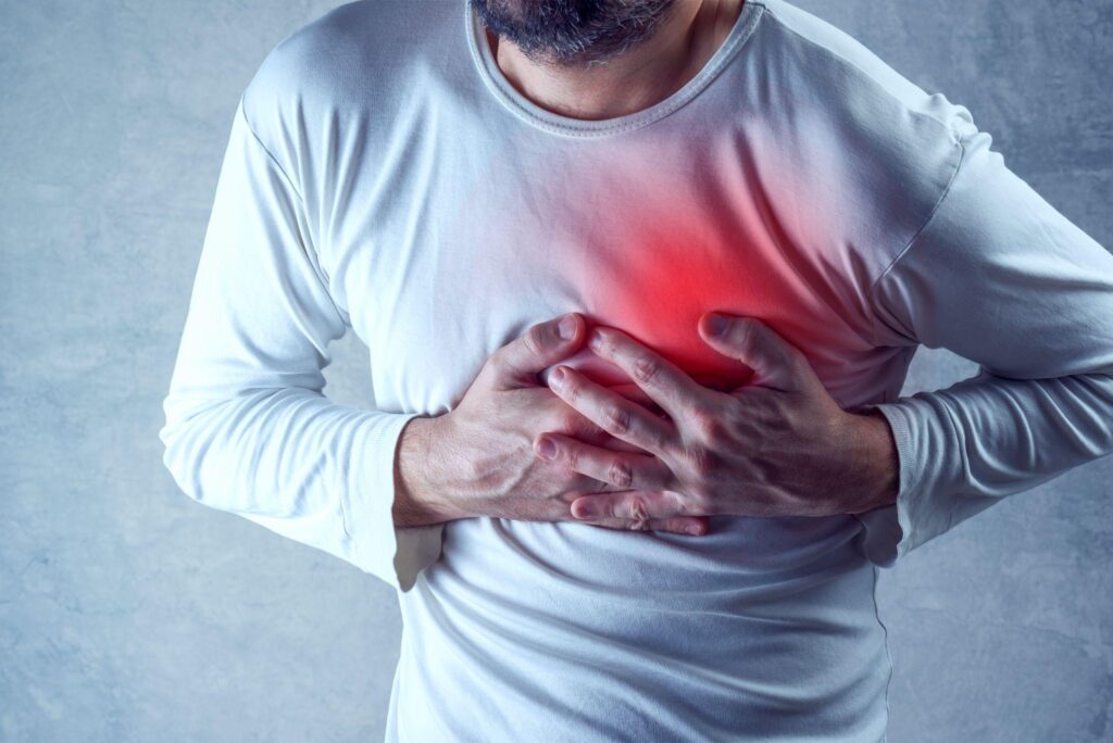 man suffering chest pain