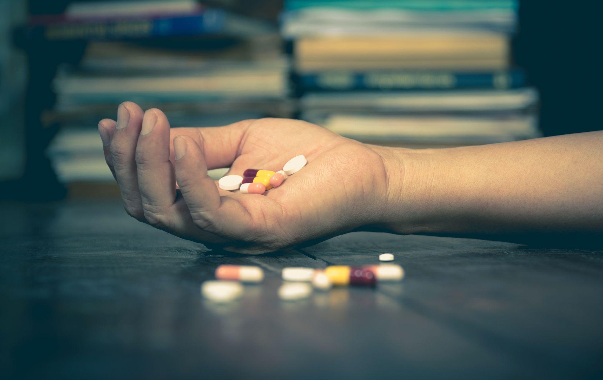 The Man Committing Suicide By Overdosing On Medication